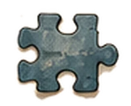 A single jigsaw piece, separated from its puzzle